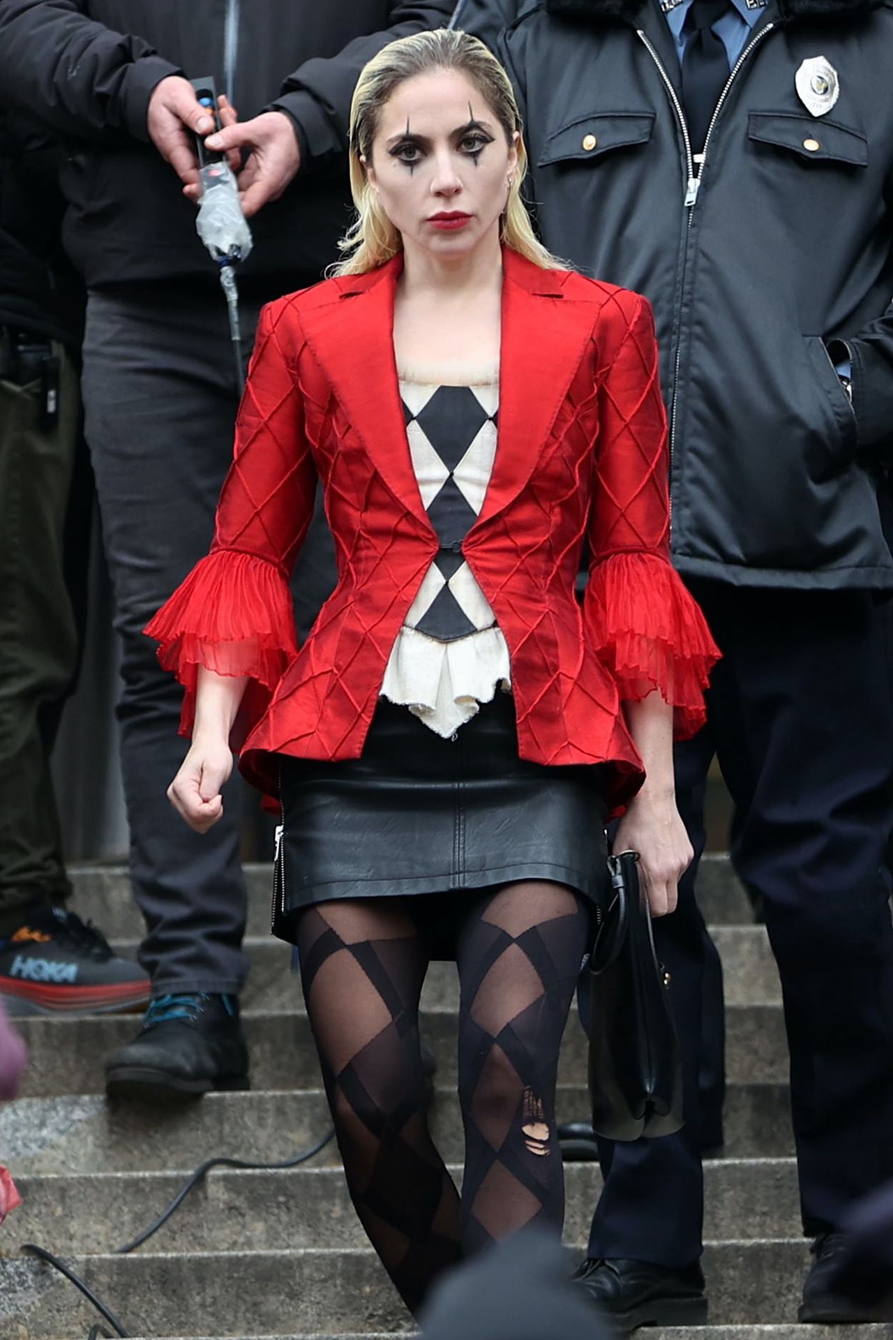 A Vision In Costume: Lady Gaga's Transformation Into Harley Quinn - Lady On Back Of 2023 Quarter