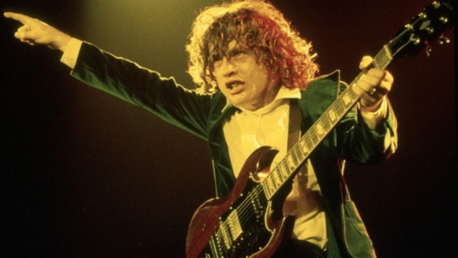 Angus Young: 15 Things You Need To Know | iHeart - How Old Is Angus Young? AC/DC Guitarist’s Rock 'n' Roll Age