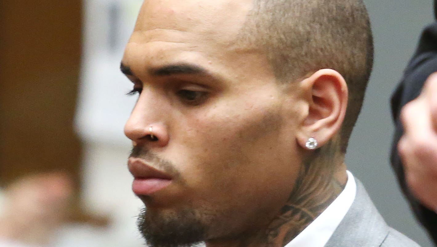 Authorities: Chris Brown arrested on warrant - Chris Brown Arrested In Manchester Over 'bottle Attack' On Music Producer At London Nightclub