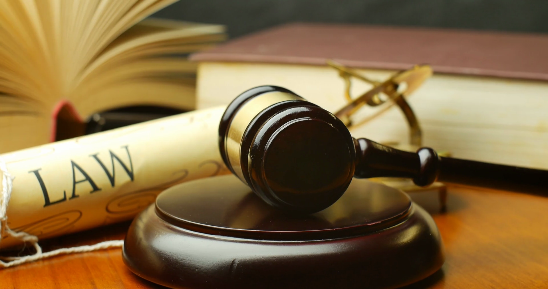 Law Justice Litigation Concept With Gavel Stock Footage SBV-302708090 - Law Offices Of Vincent S Wong